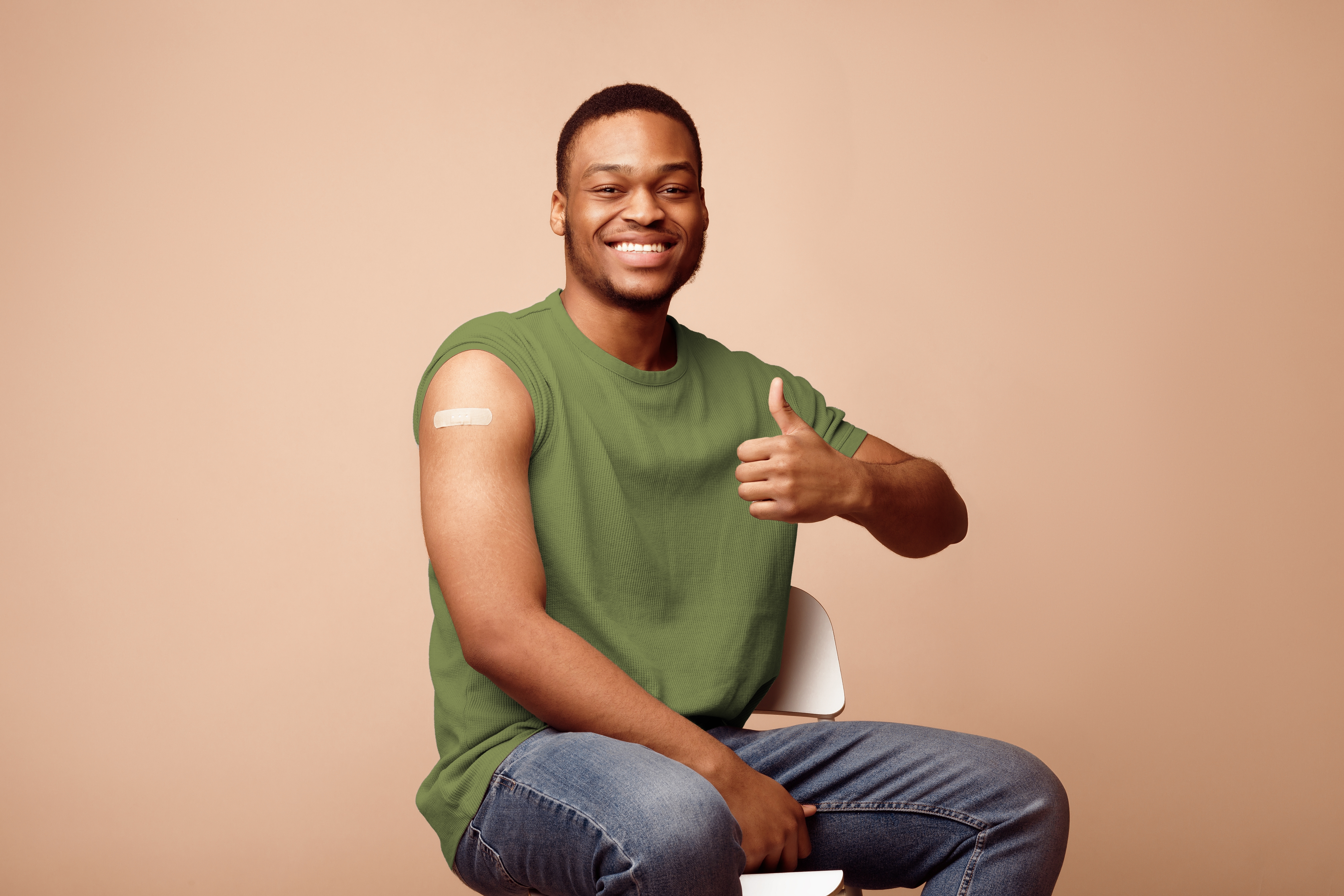 Successful,Coronavirus,Vaccination.,Happy,Vaccinated,African,Guy,Gesturing,Thumbs,Up