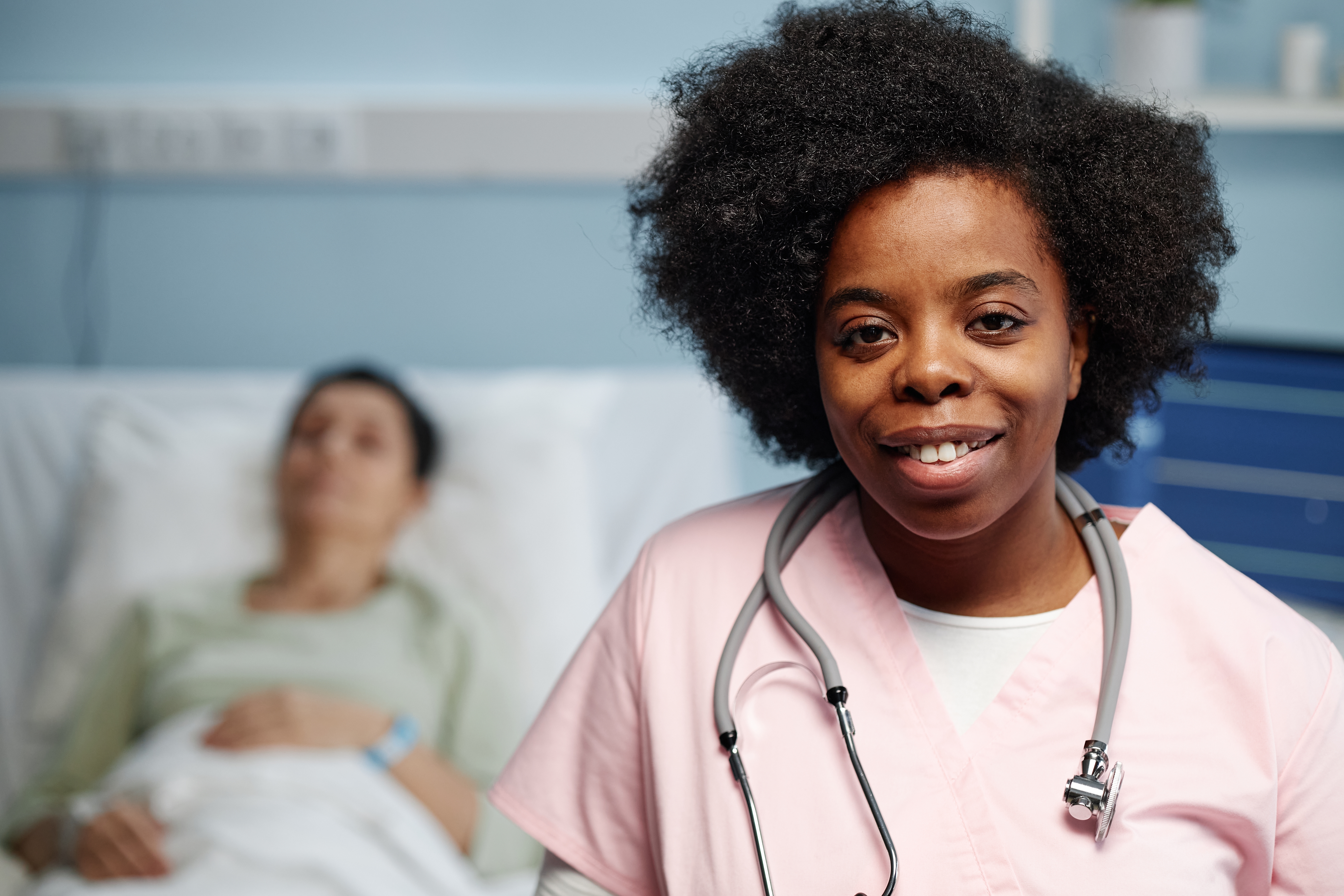 Portrait,Of,Female,African,American,Doctor,Smiling,Confidently,With,Stethoscope,