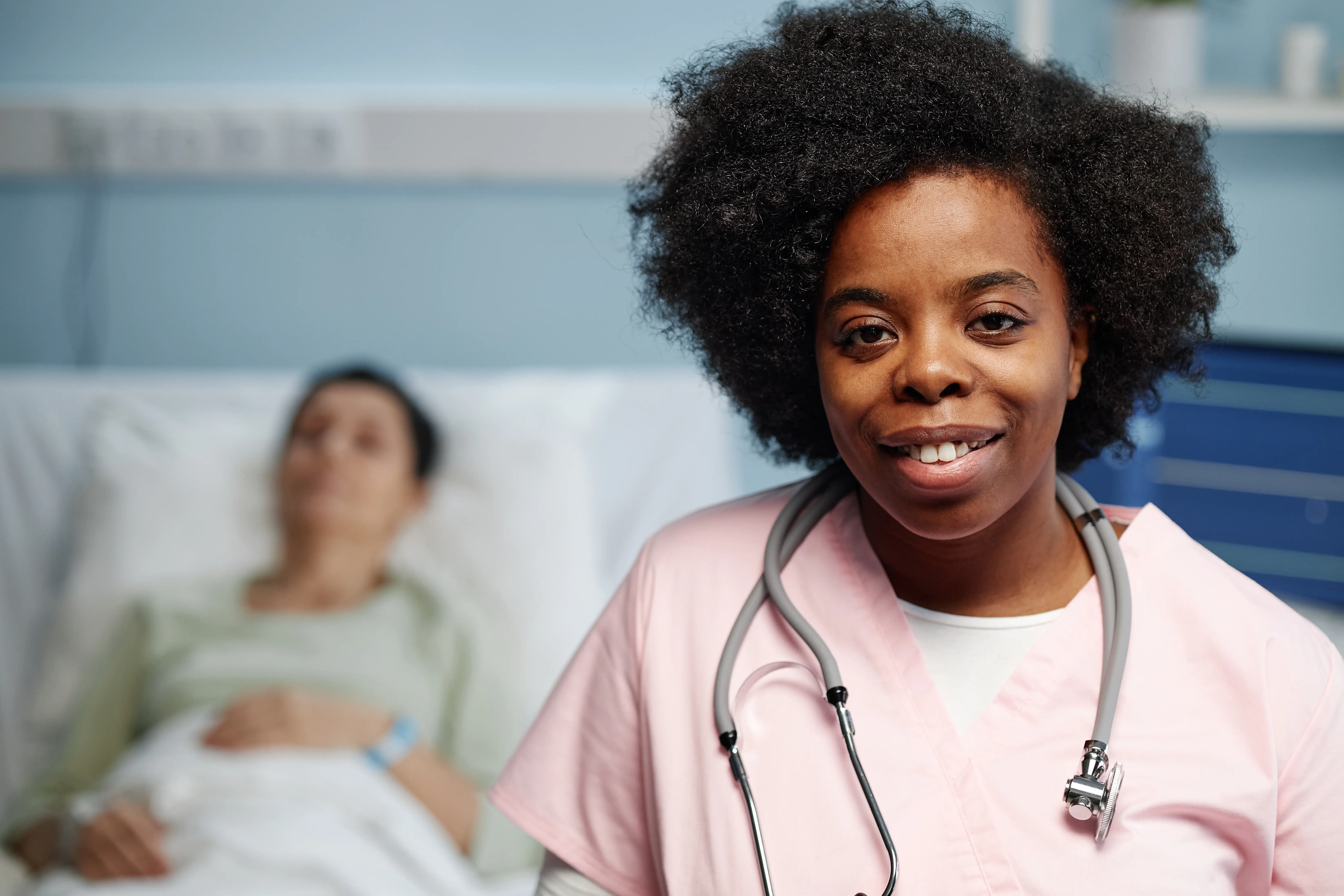 Portrait,Of,Female,African,American,Doctor,Smiling,Confidently,With,Stethoscope,