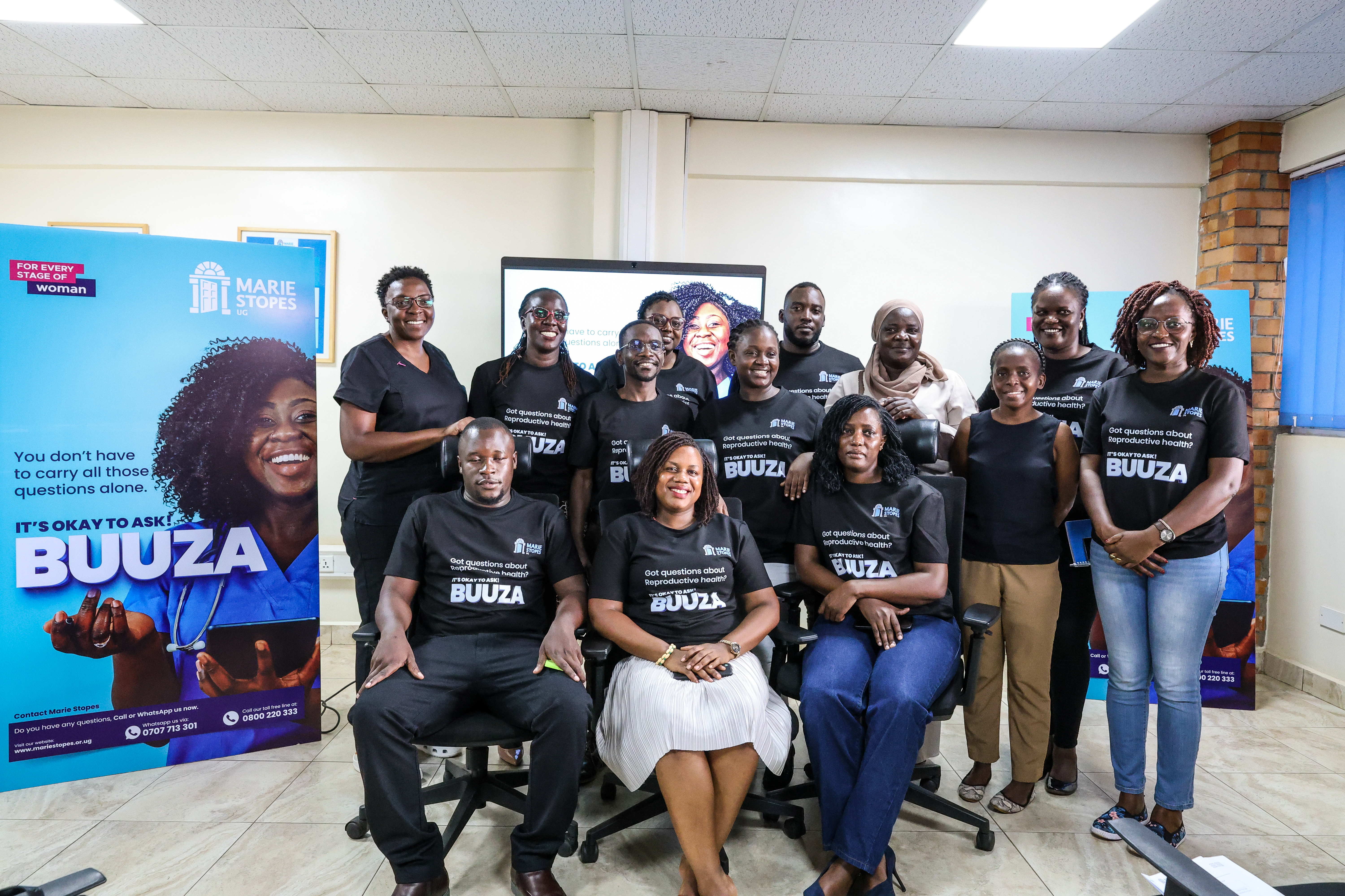 The Marie Stopes Team Posing for a group photo at the launch of the BUUZA campaign.